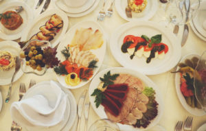 assorted food platters on table