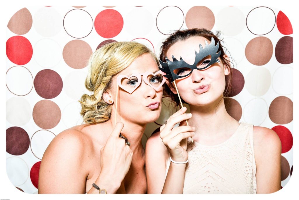 Hiring support staff - girls in photo booth